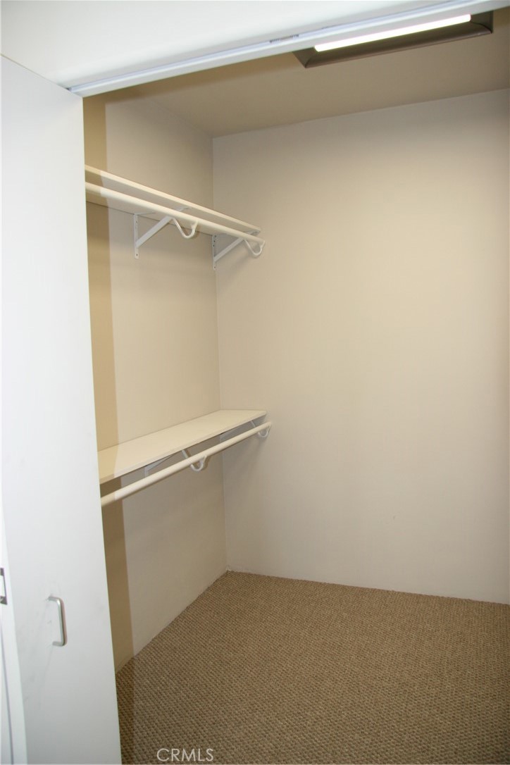 Walking closet in bedroom. Picture prior tenant - 2375 Laguna Canyon Road, Laguna Beach CA 92651 - photo 23