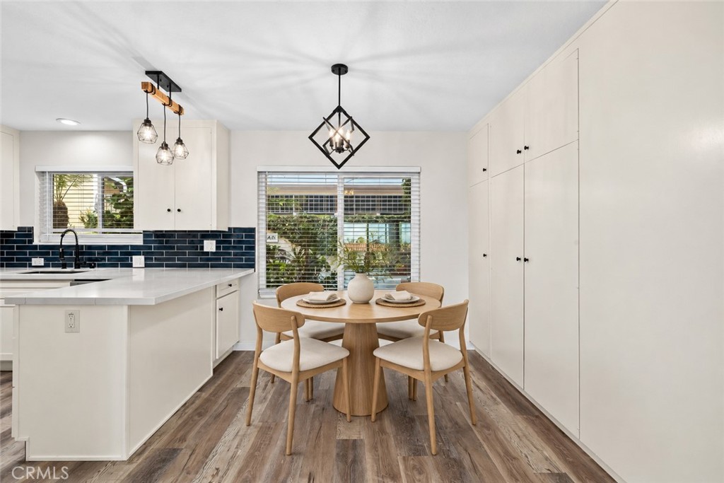 Tons of storage -eat in kitchen and large island area. (Virtual stage) - 240 Moss 2, Laguna Beach CA 92651 - photo 5