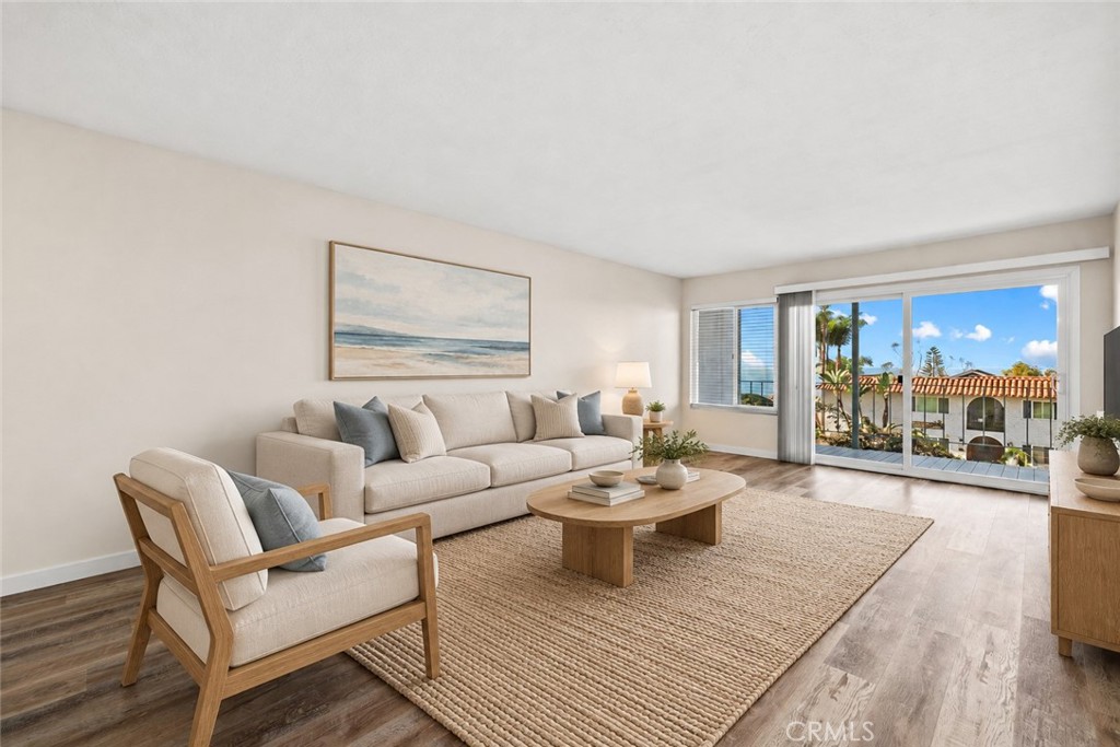 Spacious living area and huge ocean view deck. (Virtual stage) - 240 Moss 2, Laguna Beach CA 92651 - photo 8