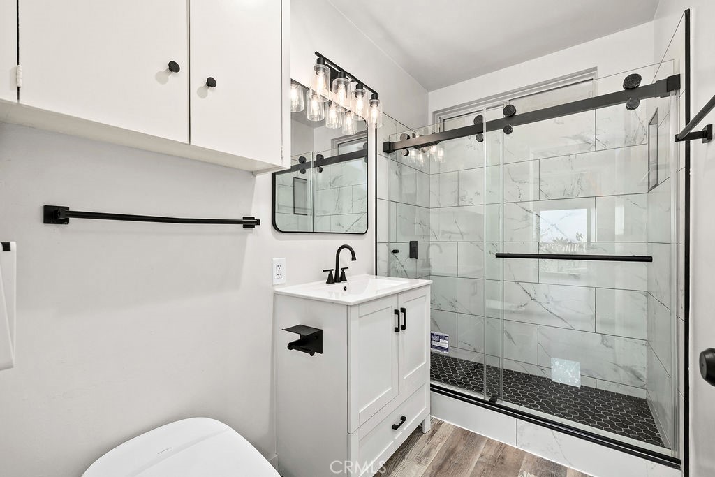 Hall bathroom remodeled with walk in shower - 240 Moss 2, Laguna Beach CA 92651 - photo 16
