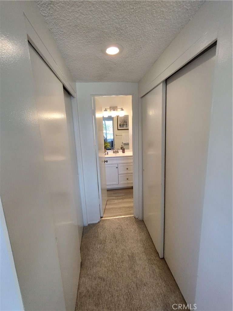 Dual closets with separate bathroom entrance - 240 Moss Street 15, Laguna Beach CA 92651 - photo 19
