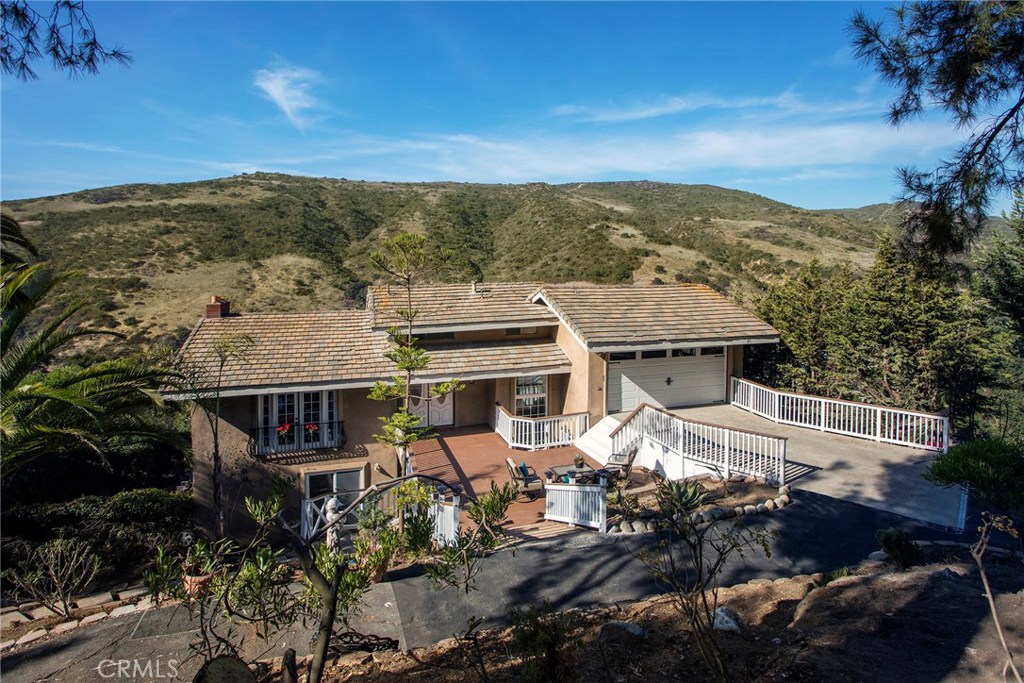 Great views of Laguna Canyon and note extra long driveway with extra valet driveway. - 25 Castle Rock Road, Laguna Beach CA 92651 - photo 1