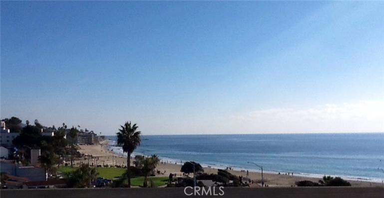 Breathtaking view of Main Beach and downtown from your living room, eating area and kitchen. - 251 3 Lower Cliff Drive, Laguna Beach CA 92651 - photo 1