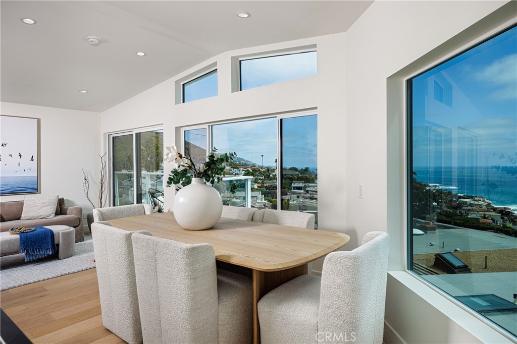 Main house: dining room showing views and looking toward living room - 251 Highland, Laguna Beach CA 92651 - photo 9