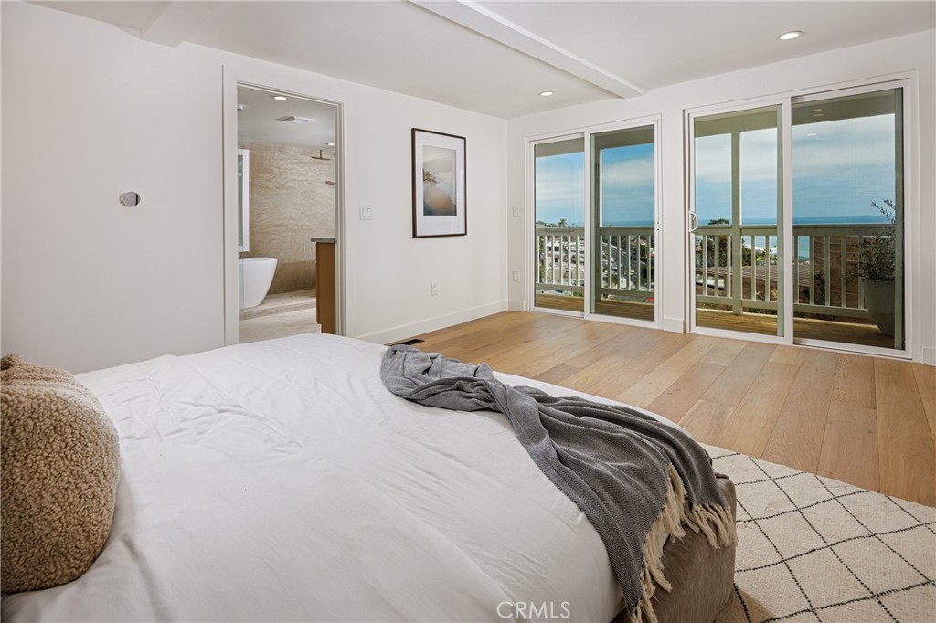 Main house: primary bedroom (lower level) - 251 Highland, Laguna Beach CA 92651 - photo 13