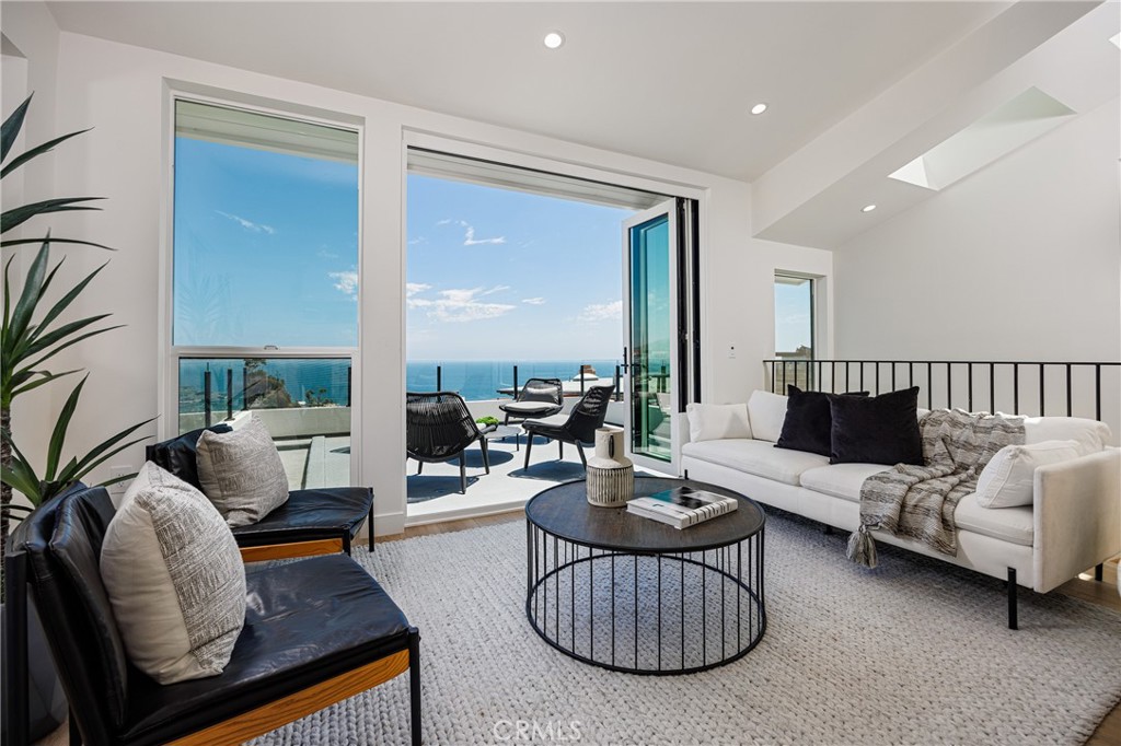 ADU: Living area with large view deck, folding doors - 251 Highland, Laguna Beach CA 92651 - photo 26