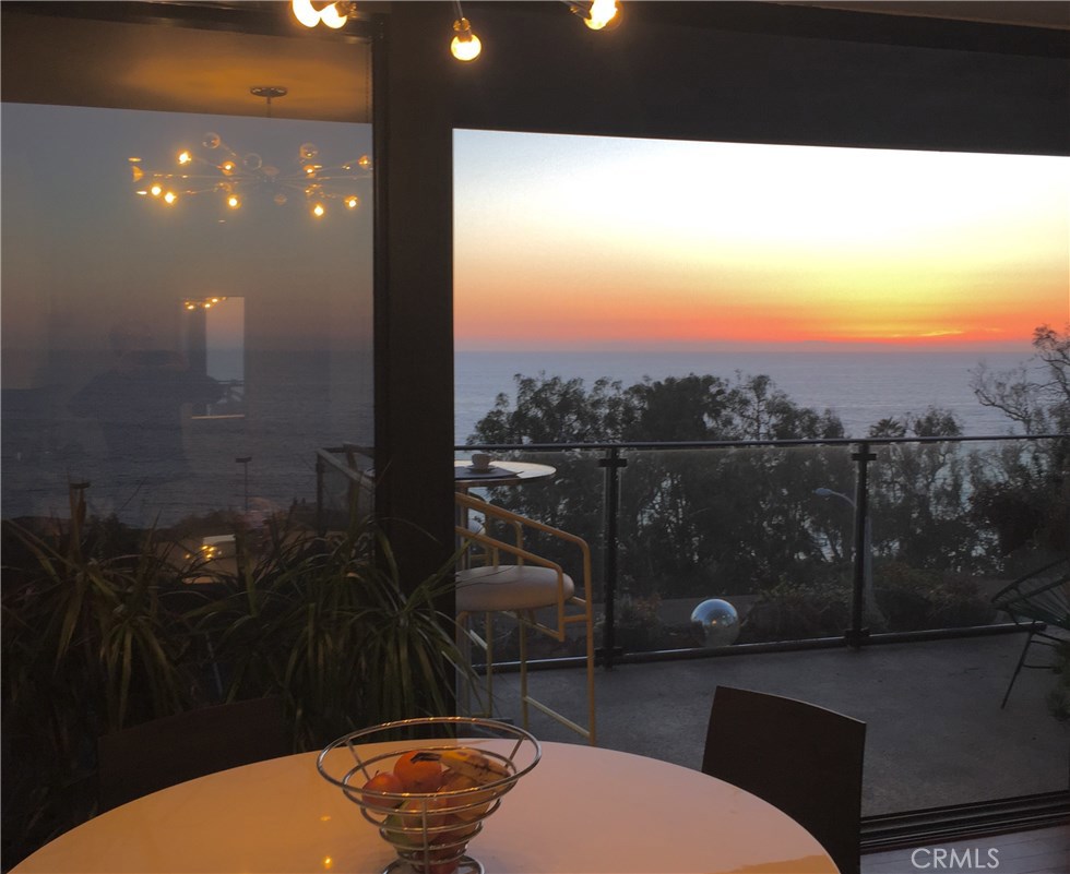Ocean view from living room and dining room - 2570 Solana Way 7, Laguna Beach CA 92651 - photo 1