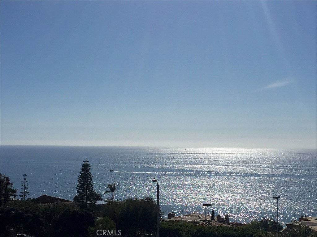Ocean view from living room, kitchen and dining room - 2570 Solana Way 7, Laguna Beach CA 92651 - photo 1