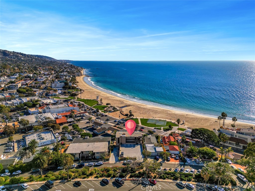 Ariel view with beach front & city views - 259 Lower Cliff Drive 9, Laguna Beach CA 92651 - photo 1