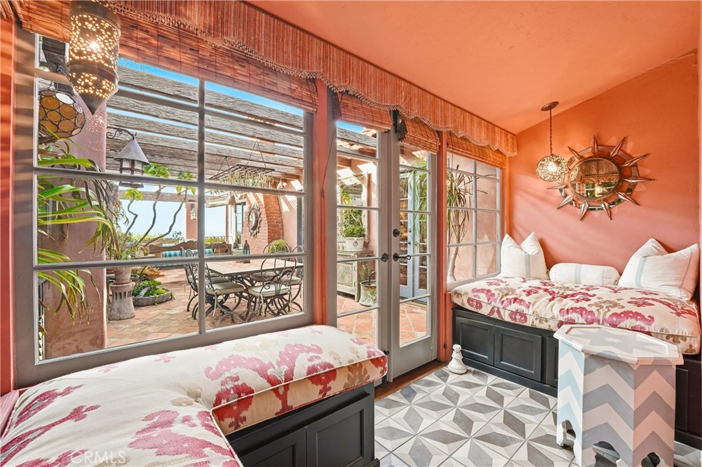 Sitting Room off the Primary with entrance to outdoor Patio - 260 High, Laguna Beach CA 92651 - photo 22