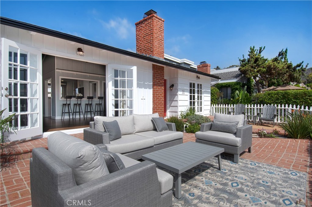 Looking back into the living from the large patio - 262 Grandview Street, Laguna Beach CA 92651 - photo 1