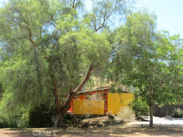 Home nestled in mature pepper trees - 272 Canyon Acres Drive, Laguna Beach CA 92651 - photo 1