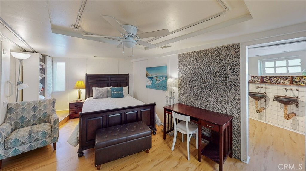 Beddroom with couch, TV - 274 Diamond Street 1, Laguna Beach CA 92651 - photo 1