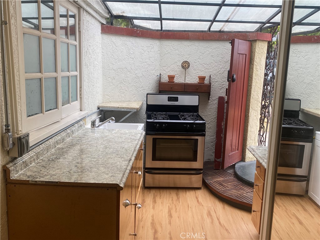 Full kitchen open to breezes - 274 Diamond Street 1, Laguna Beach CA 92651 - photo 18