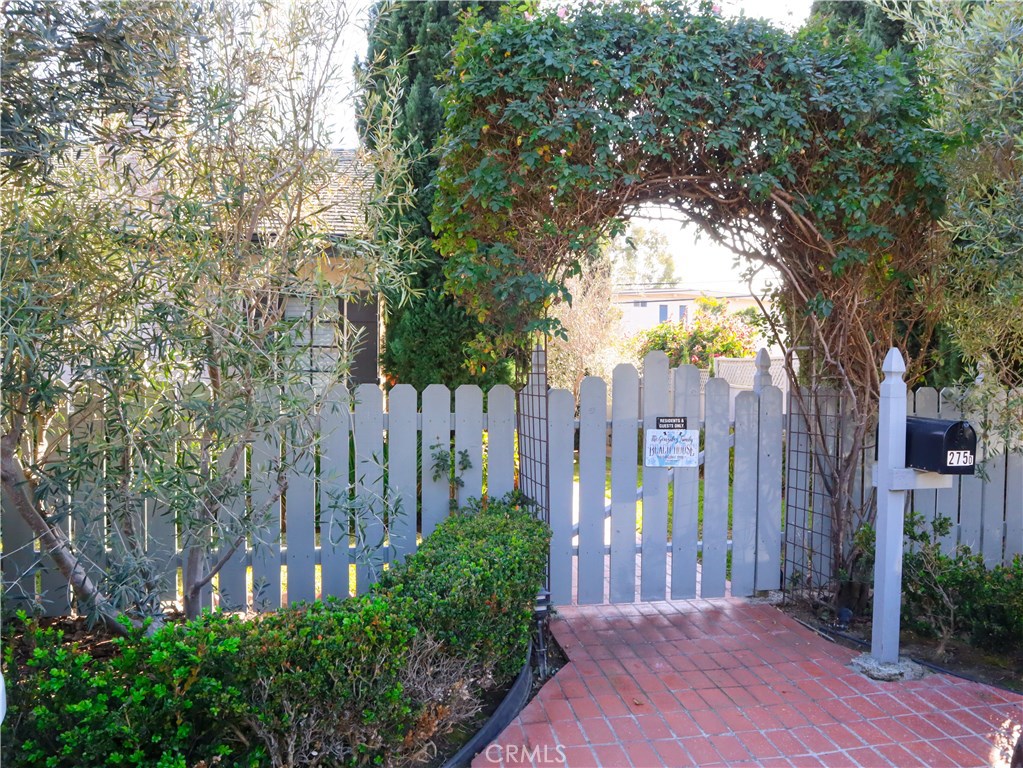 Welcome to a truly charming Laguna Beach cottage and private spacious yard. - 275 Cypress Drive D, Laguna Beach CA 92651 - photo 1
