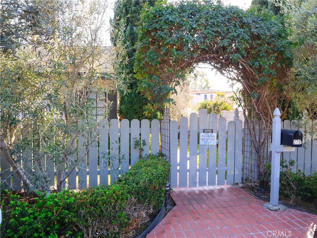 Welcome to a truly charming Laguna Beach cottage with a private spacious landscaped yard. - 275 Cypress Drive, Laguna Beach CA 92651 - photo 1