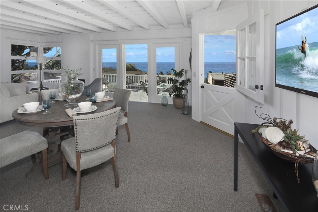 LIVING AND DINING AREA OPENS TO LARGE DECK - 2856 Rounsevel, Laguna Beach CA 92651 - photo 1