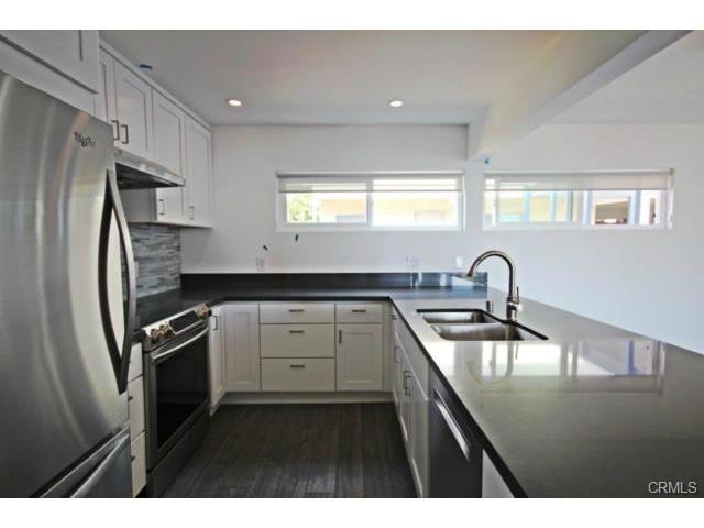 Gorgeous stainless steel appliances, Pental quartz counter-tops, engineered oak flooring. - 287 San Joaquin Drive, Laguna Beach CA 92651 - photo 1