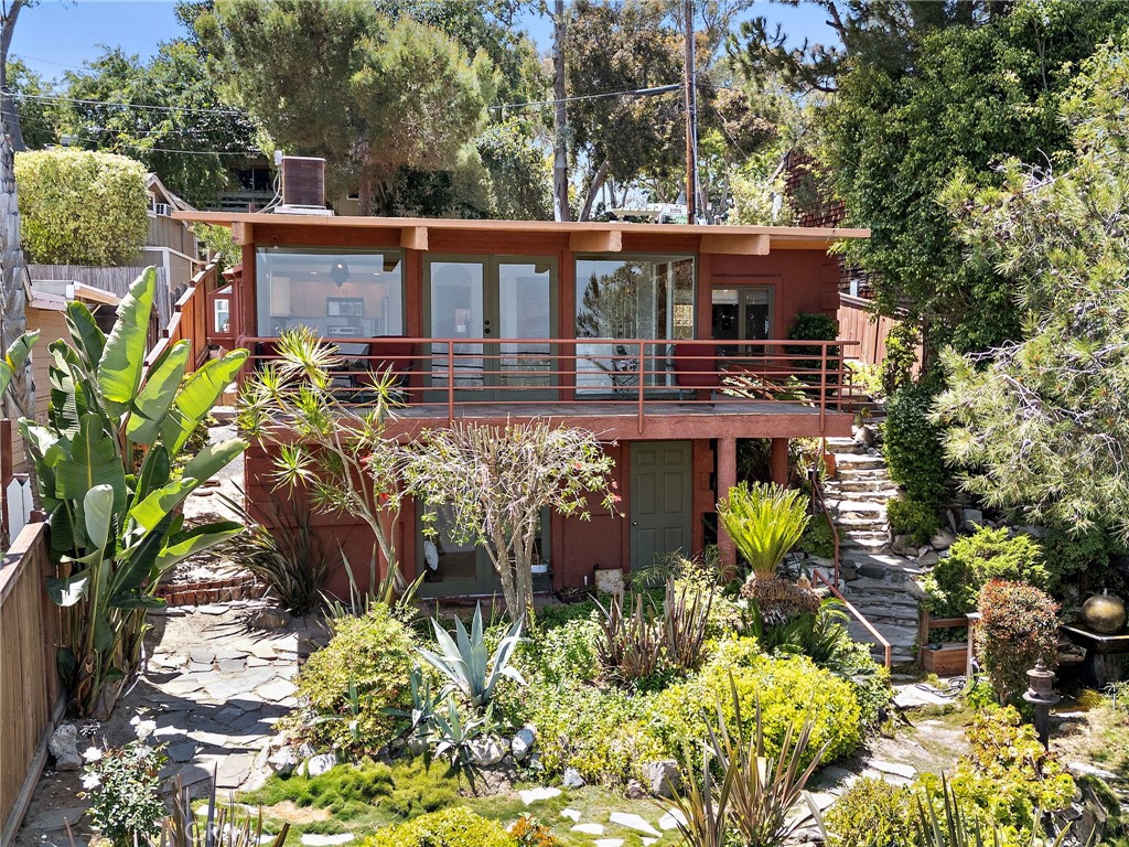 A beautiful lush garden with an outstanding view of South Orange County - 28751 Top Of The World, Laguna Beach CA 92651 - photo 1