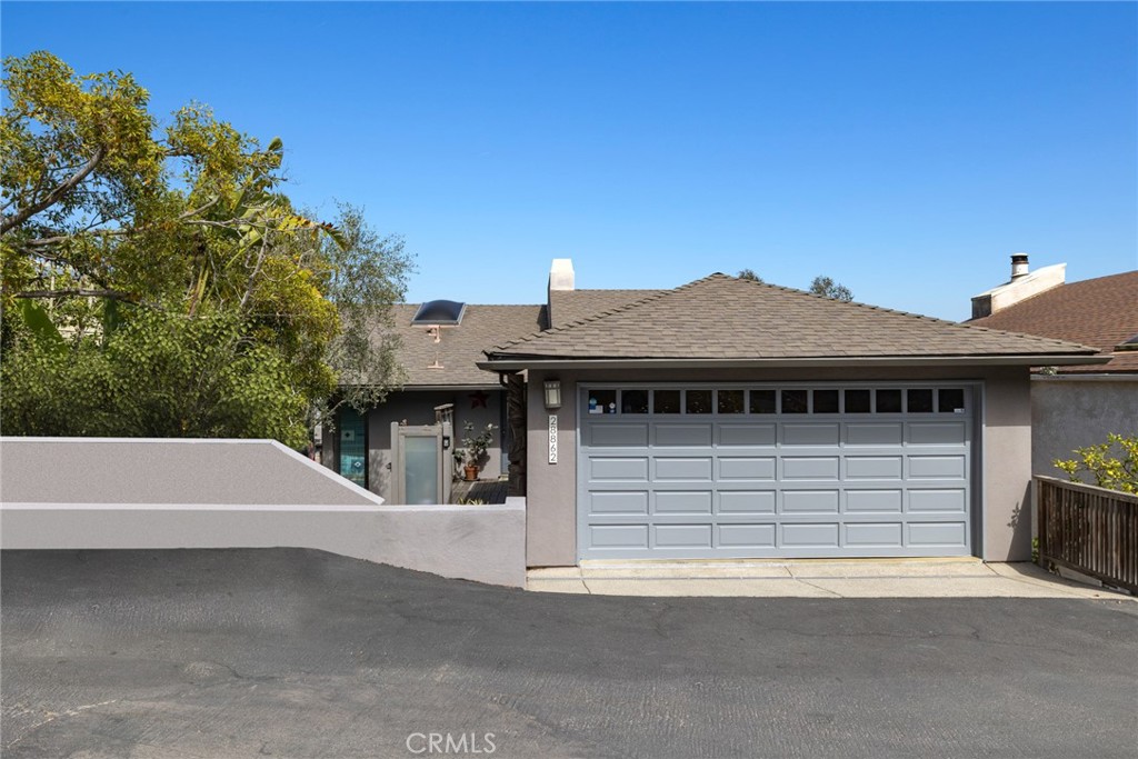 The spacious floorplan measures approximately 2,643 square feet and is complemented by an attached two-car garage and qu - 28862 Top of the World Drive, Laguna Beach CA 92651 - photo 2