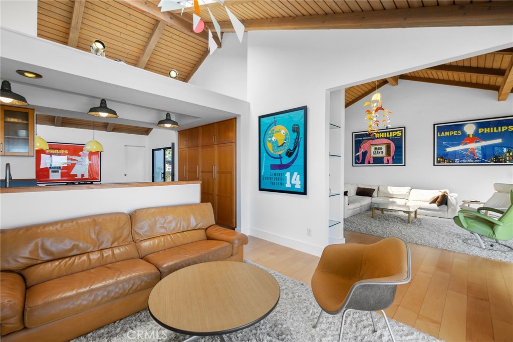 Sublime style continues in living and family rooms. - 28862 Top of the World Drive, Laguna Beach CA 92651 - photo 8