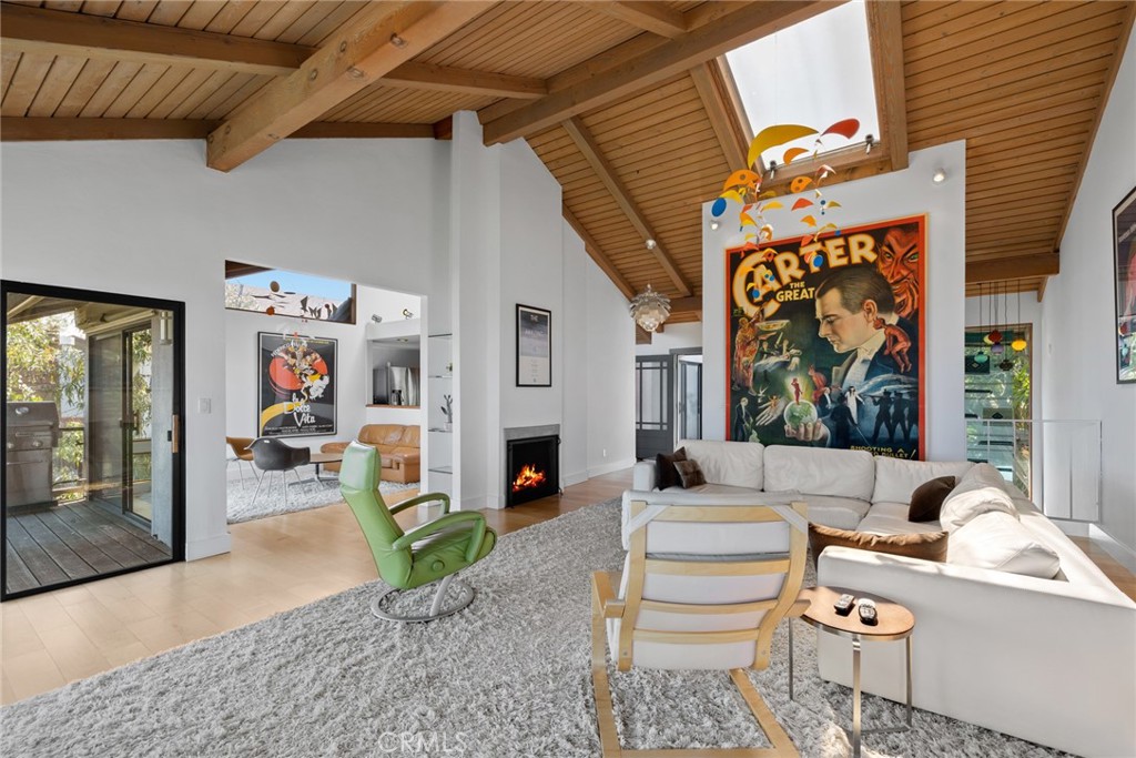 While lofty vaulted ceilings and skylights enhance its airy vibe. - 28862 Top of the World Drive, Laguna Beach CA 92651 - photo 9