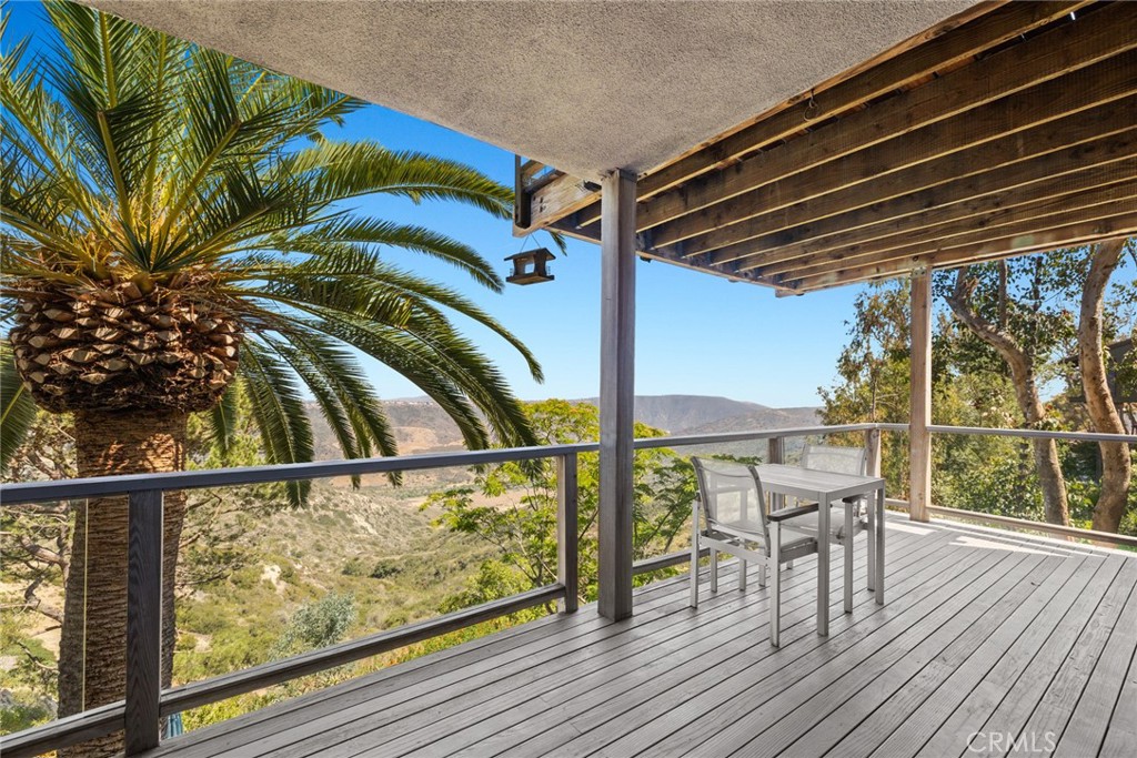 Spacious decks surround a great portion of the property, providing the perfect venue for outdoor entertaining, al fresco - 28862 Top of the World Drive, Laguna Beach CA 92651 - photo 13