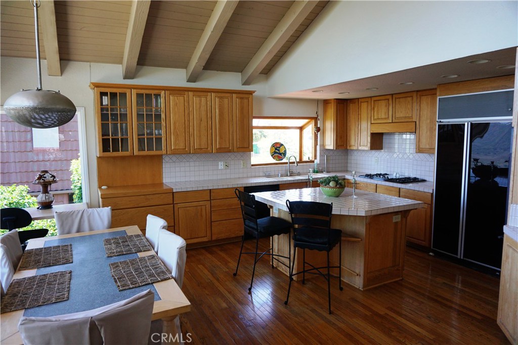 Open kitchen with island seating - 28882 Top Of The World Drive, Laguna Beach CA 92651 - photo 1