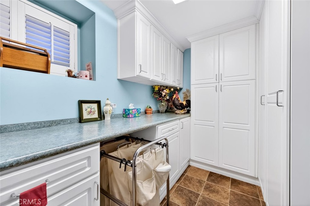 Laundry room with ample storage. - 2896 Terry Rd, Laguna Beach CA 92651 - photo 47