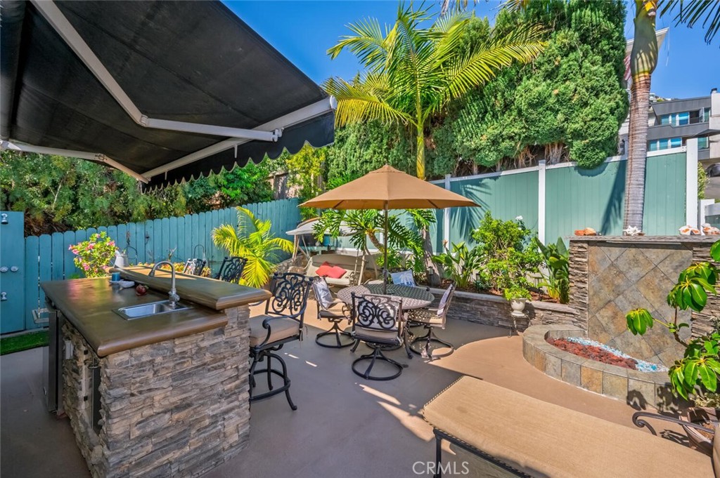 Backyard with outdoor kitchen and fir pit. - 2896 Terry Rd, Laguna Beach CA 92651 - photo 54