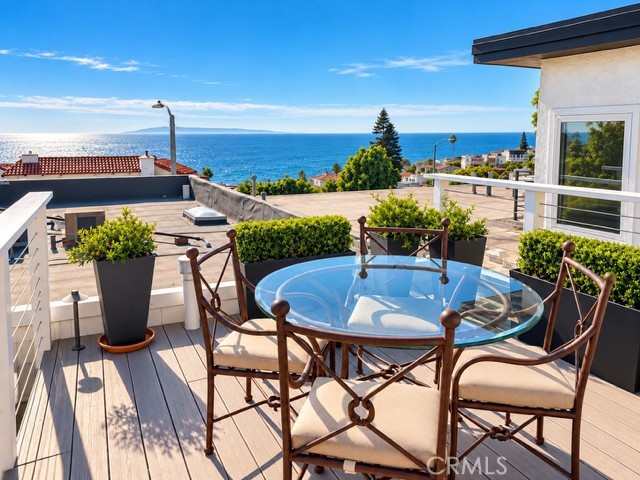 This deck is located just up the stairs from the garden. - 2948 S Coast Highway, Laguna Beach CA 92651 - photo 2