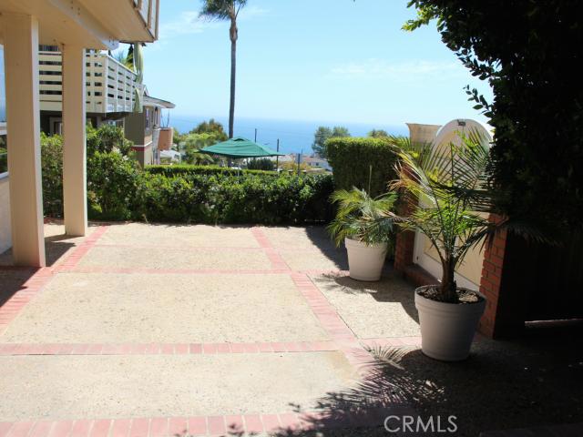 Welcome to 297 Beverly! This fabulous garden patio is ready for summer bbq's and sunsets! - 297 Beverly Street, Laguna Beach CA 92651 - photo 1