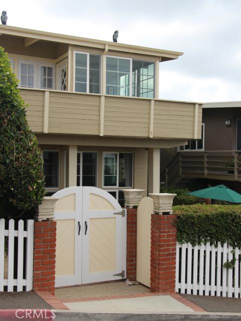 Facing view on Beverly Street showing beautiful glassed in breakfast area and front deck - 299 Beverly Street, Laguna Beach CA 92651 - photo 1