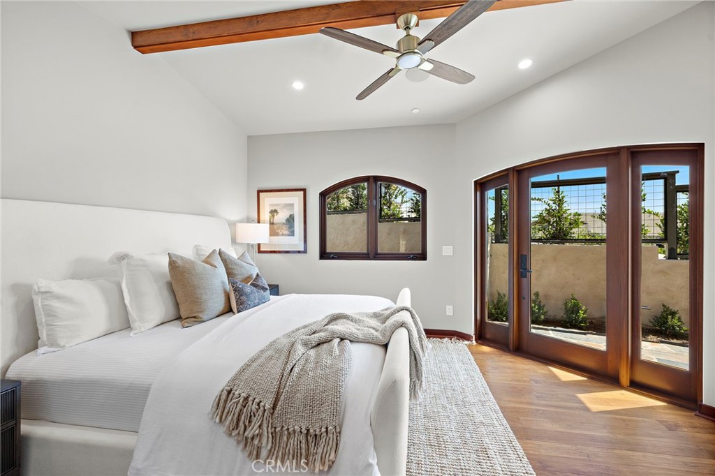 Primary bedroom with reclaimed Honduras Mahogany windows and door - 3002 Dorn Court, Laguna Beach CA 92651 - photo 14