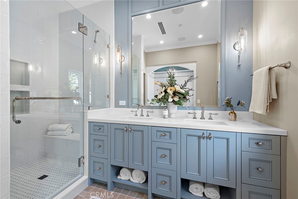 Primary bath with Toto toilet, Newport Brass faucets, Quartz counters, and gorgeous Argile Siena tile flooring - 3002 Dorn Court, Laguna Beach CA 92651 - photo 19