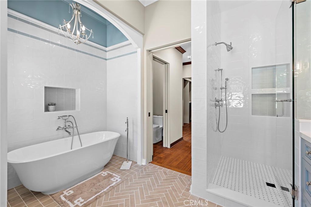 Victoria and Albert Amiata soaking tub and walk-in shower with Onda Gloss White walls and Sheet Basketweave flooring - 3002 Dorn Court, Laguna Beach CA 92651 - photo 21