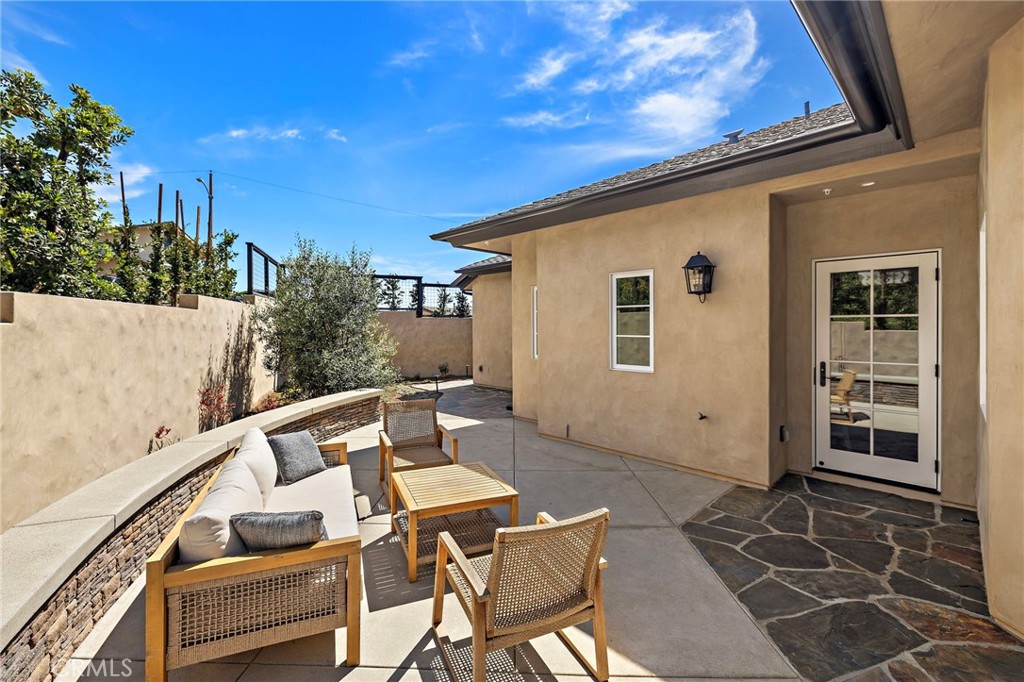 Backyard and back patio area is fully fenced, landscaped, and hardscaped. - 3002 Dorn Court, Laguna Beach CA 92651 - photo 27