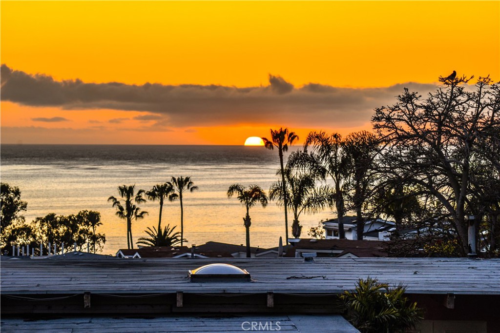 Sunset view from rooftop raised poolside terrace. - 30722 Marilyn Drive, Laguna Beach CA 92651 - photo 1