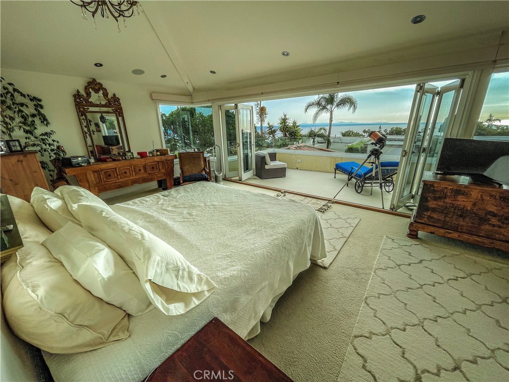 Main bedroom overlooking the Pacific Ocean, Catalina Island and the neighborhood - 30722 Marilyn Drive, Laguna Beach CA 92651 - photo 14