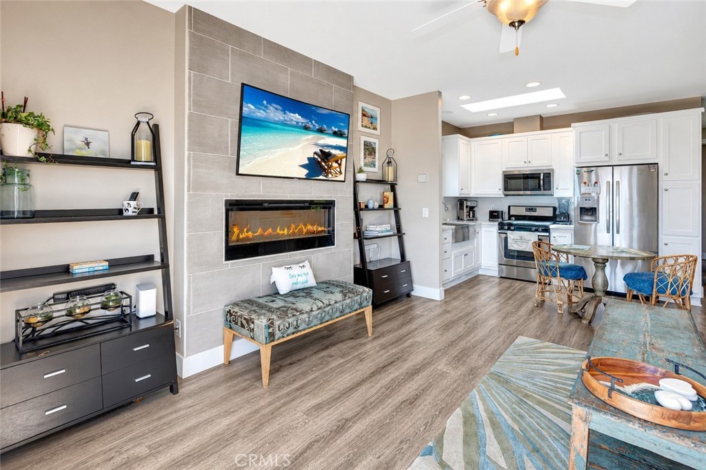open area between living room and kitchen creating that great room experience - 30802 Coast F25, Laguna Beach CA 92651 - photo 8