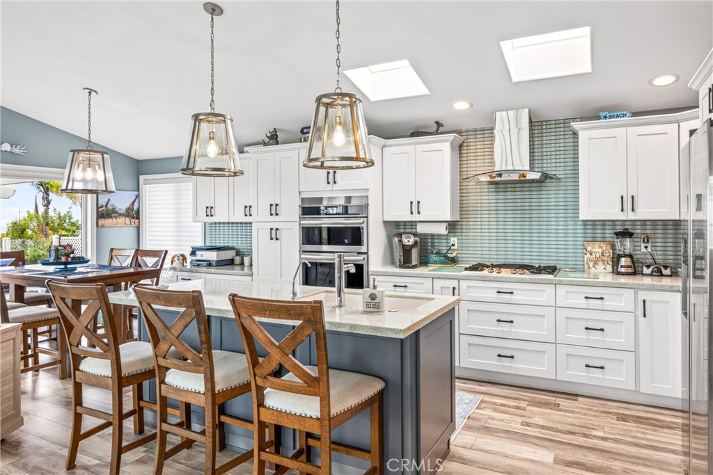 Kitchen with breakfast counter - 30802 S Coast Highway F-10, Laguna Beach CA 92651 - photo 5