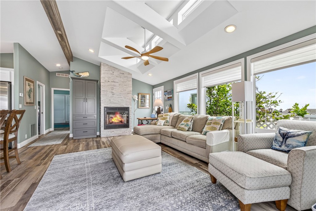 Living room with fireplace - 30802 S Coast Highway F-10, Laguna Beach CA 92651 - photo 6