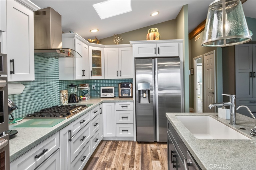 Kitchen open to living room - 30802 S Coast Highway F-10, Laguna Beach CA 92651 - photo 9