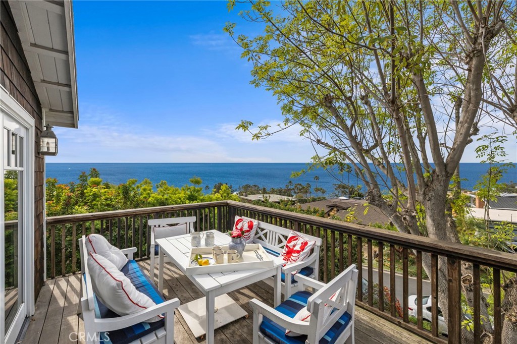 Beautiful ocean view from the upper living room deck - 30842 Driftwood Drive, Laguna Beach CA 92651 - photo 2