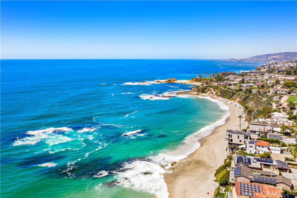 Aliso Beach is across the private pedestrian bridge from the Aliso Circle neighborhood. - 31004 Aliso Circle, Laguna Beach CA 92651 - photo 1