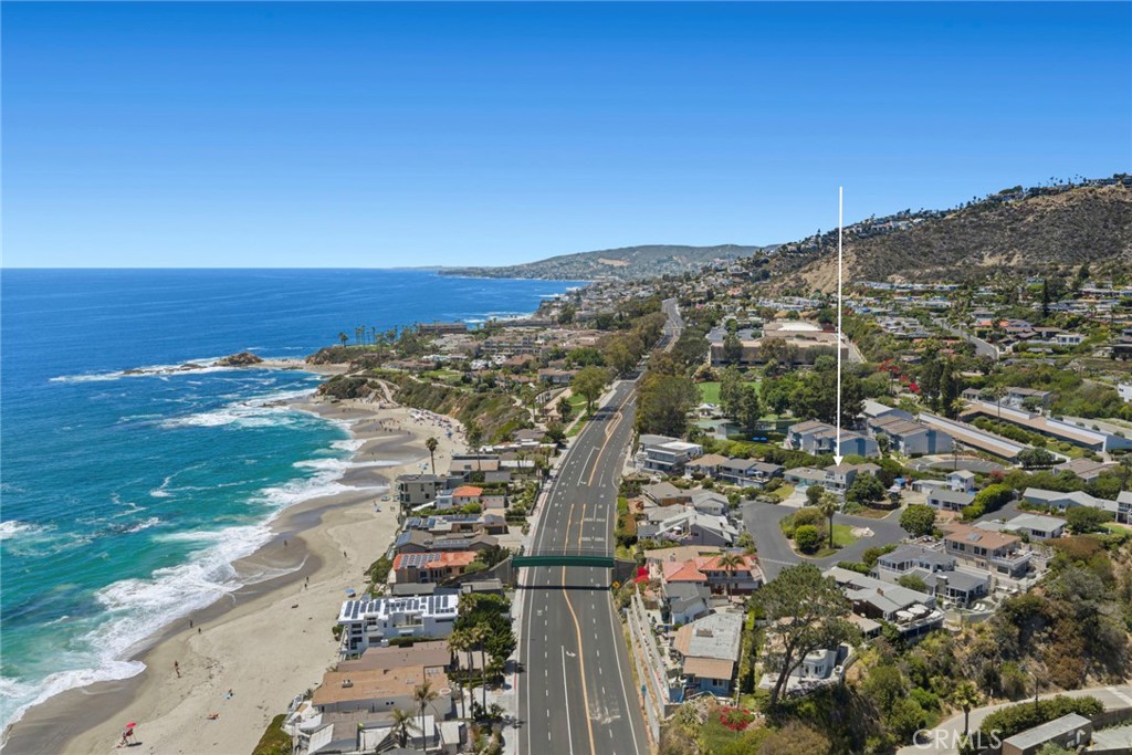 Offering approximately 2,139 square feet, this thoughtfully designed home features three bedrooms and two and 1/2 bathro - 31012 Aliso Circle, Laguna Beach CA 92651 - photo 2