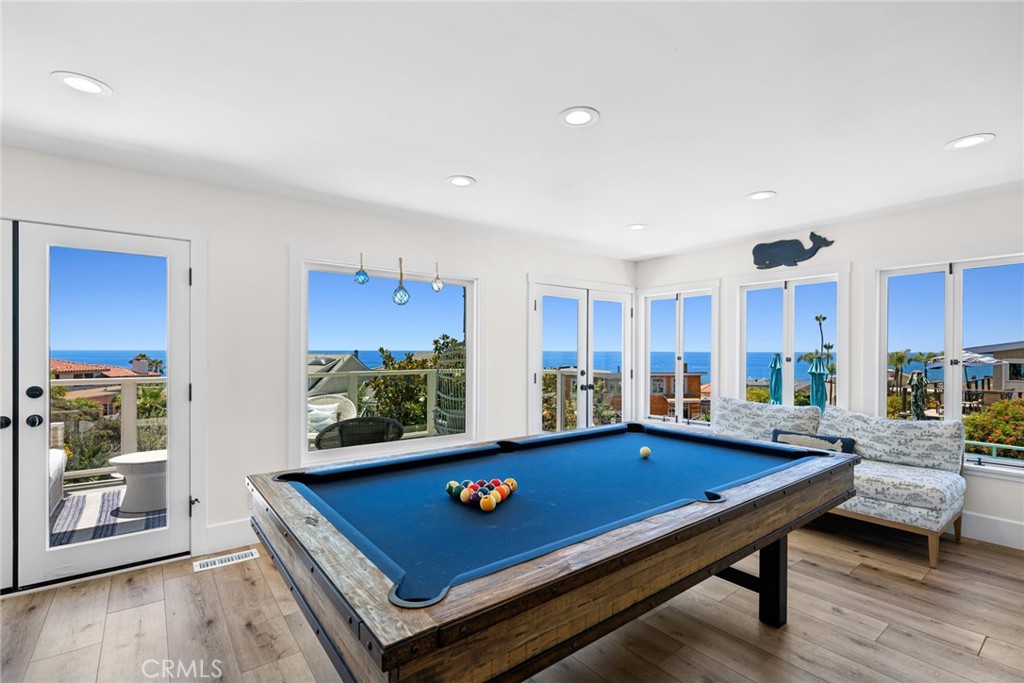 An additional family room offers flexibility as a media room or lounge. - 31012 Aliso Circle, Laguna Beach CA 92651 - photo 5