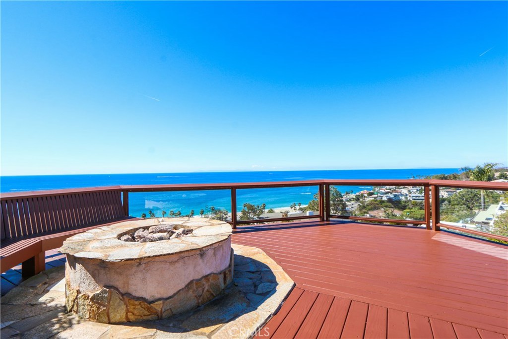 Enjoy sweeping views from the spacious deck, perfect for entertaining and relaxing. The views include Catalina Island, P - 31122 Brooks Street, Laguna Beach CA 92651 - photo 1