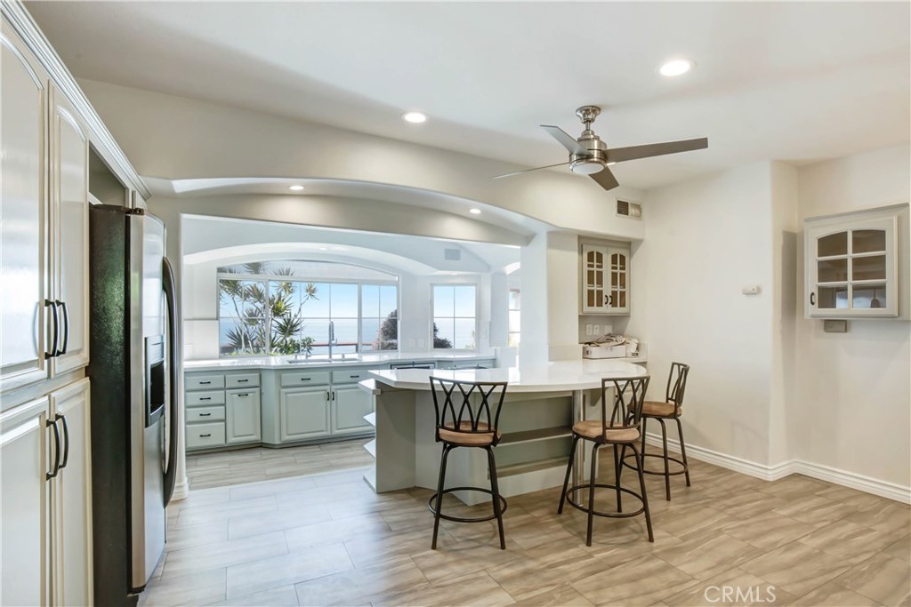 Remodeled ocean view kitchen with attached ocean view deck! Kitchen windows have been updated. - 31122 Brooks Street, Laguna Beach CA 92651 - photo 4