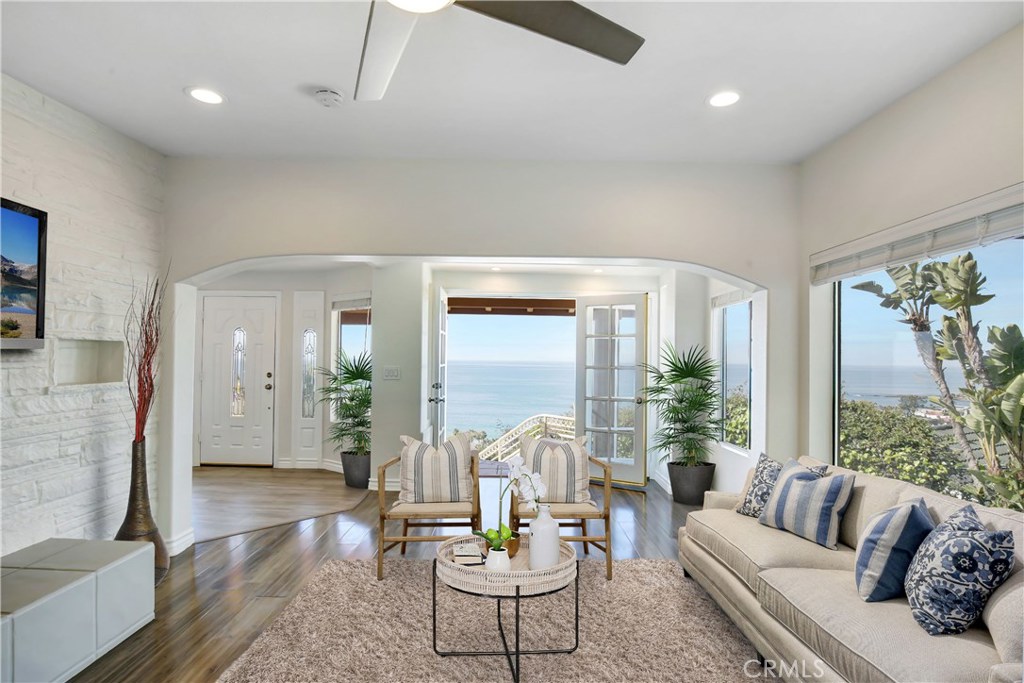 A gorgeous ocean view living room with deck attached. - 31122 Brooks Street, Laguna Beach CA 92651 - photo 8